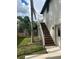 Brown wooden staircase leading to a backyard patio at 1301 22Nd N Ave, St Petersburg, FL 33704