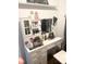 Stylish white vanity with ample storage and a lighted mirror at 1301 22Nd N Ave, St Petersburg, FL 33704