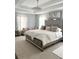 Spacious Primary bedroom with large bed, sitting area, and chandelier at 1301 22Nd N Ave, St Petersburg, FL 33704