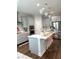 Modern kitchen with gray cabinets, white countertops and a breakfast bar at 1301 22Nd N Ave, St Petersburg, FL 33704