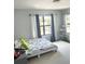 bedroom with a white bed, rug and plenty of natural light at 1301 22Nd N Ave, St Petersburg, FL 33704