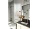 Clean bathroom with gray tile, a white vanity, and a bathtub at 1301 22Nd N Ave, St Petersburg, FL 33704