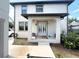 Covered patio with double doors and a small sitting area at 1301 22Nd N Ave, St Petersburg, FL 33704
