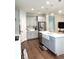 Modern kitchen with gray cabinets, white quartz countertops, and a farmhouse sink at 1301 22Nd N Ave, St Petersburg, FL 33704