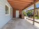 Covered patio with additional bar and backyard view at 18053 2Nd E St, Redington Shores, FL 33708