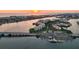 Stunning aerial view of waterfront community at sunset at 7974 Sailboat Key S Blvd # 504, South Pasadena, FL 33707