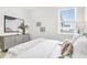 Spacious bedroom featuring a comfortable bed and large window at 3839 71St N St, St Petersburg, FL 33709