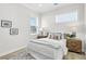 Serene bedroom with a comfortable bed and wooden nightstands at 3839 71St N St, St Petersburg, FL 33709