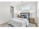 Modern bedroom with a gray headboard and built-in closet at 3839 71St N St, St Petersburg, FL 33709