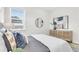Bright bedroom with a comfortable bed and stylish decor at 3839 71St N St, St Petersburg, FL 33709