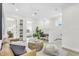 Cozy sitting area with a leather couch, coffee table and built-in shelving at 3839 71St N St, St Petersburg, FL 33709