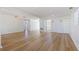 Spacious living room with open floor plan and wood flooring at 135 Se Monroe N Cir, St Petersburg, FL 33703