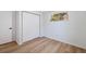 Spacious bedroom with large closet and wood-look floors at 135 Se Monroe N Cir, St Petersburg, FL 33703