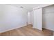 Simple bedroom with light walls and wood-look floors at 135 Se Monroe N Cir, St Petersburg, FL 33703