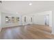 Open concept living room with hardwood floors and lots of light at 135 Se Monroe N Cir, St Petersburg, FL 33703