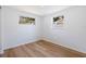 Bright bedroom with wood-look floors and neutral walls at 135 Se Monroe N Cir, St Petersburg, FL 33703