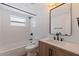 Updated bathroom with modern vanity, fixtures, and a bathtub at 135 Se Monroe N Cir, St Petersburg, FL 33703