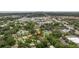 Aerial view showing home's location in a residential neighborhood near the coast at 135 Se Monroe N Cir, St Petersburg, FL 33703