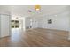 Bright and spacious living room featuring light wood flooring at 135 Se Monroe N Cir, St Petersburg, FL 33703