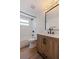 Updated bathroom with a new vanity, bathtub, and stylish mirror at 135 Se Monroe N Cir, St Petersburg, FL 33703