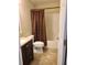 Clean bathroom with a shower/tub combo and vanity at 2719 Mingo Dr, Land O Lakes, FL 34638