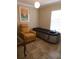 Relaxation room with a massage bed and comfortable chair at 2719 Mingo Dr, Land O Lakes, FL 34638