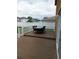 Spacious deck with table and chairs, perfect for outdoor dining and entertaining at 2719 Mingo Dr, Land O Lakes, FL 34638