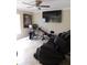 Home gym with exercise equipment and a massage chair at 2719 Mingo Dr, Land O Lakes, FL 34638
