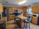 Spacious kitchen with island and stainless steel appliances at 2719 Mingo Dr, Land O Lakes, FL 34638