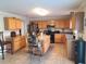 Spacious kitchen with an island and stainless steel appliances at 2719 Mingo Dr, Land O Lakes, FL 34638