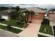 Two story house with palm trees and driveway at 2719 Mingo Dr, Land O Lakes, FL 34638