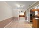 Dining area with adjacent kitchen and living room at 109 W Grapefruit Cir, Clearwater, FL 33759