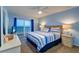 Main bedroom with king-size bed and ocean view at 3500 Gulf Blvd # 408, Belleair Beach, FL 33786