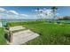 Horseshoe pits next to the tennis courts with waterfront views at 9 Haig Pl # 312, Dunedin, FL 34698