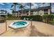 Relaxing community hot tub with seating area at 8693 Bardmoor Blvd # 202B, Seminole, FL 33777