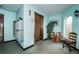 Building lobby with elevator, mailboxes, and seating area at 8693 Bardmoor Blvd # 202B, Seminole, FL 33777