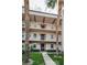 Attractive two-story building exterior with landscaping at 8693 Bardmoor Blvd # 202B, Seminole, FL 33777