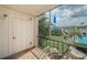 Relaxing lanai with pool and garden views at 8693 Bardmoor Blvd # 202B, Seminole, FL 33777