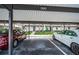 Reserved carport parking space with convenient access to building at 8693 Bardmoor Blvd # 202B, Seminole, FL 33777