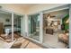 View of lanai showcasing access to living room and bedroom at 8693 Bardmoor Blvd # 202B, Seminole, FL 33777