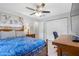 Spacious bedroom with a king-size bed and built-in wardrobe at 7201 15Th N St, St Petersburg, FL 33702