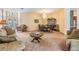 Bright dining room with a chandelier, hardwood floors, and a large hutch at 22531 Eagles Watch Dr, Land O Lakes, FL 34639