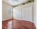 Spacious bedroom with wood floors and large closet at 22531 Eagles Watch Dr, Land O Lakes, FL 34639