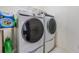 Laundry room with washer and dryer included at 22531 Eagles Watch Dr, Land O Lakes, FL 34639