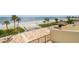 Stunning beach view from the patio of the condo; complete with a tiki bar and ocean views at 14950 Gulf Blvd # 404, Madeira Beach, FL 33708