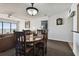 Dining room has a table with seating for 4 and flows into the living area at 14950 Gulf Blvd # 404, Madeira Beach, FL 33708