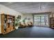 Relaxing common area with comfortable seating and bookshelves at 3300 Fox Chase N Cir # 231, Palm Harbor, FL 34683