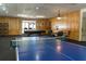 Game room with ping pong table and billiard table at 3300 Fox Chase N Cir # 231, Palm Harbor, FL 34683