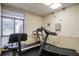 Well-equipped fitness center with treadmills and other exercise machines at 3300 Fox Chase N Cir # 231, Palm Harbor, FL 34683