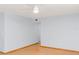 Spacious living room with hardwood floors and light walls at 3300 Fox Chase N Cir # 231, Palm Harbor, FL 34683
